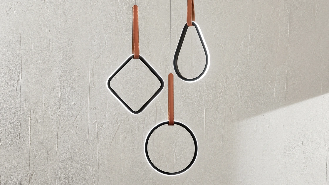 Lampada a sospensione in metallo ed ecopelle Regoli di Ondaluce