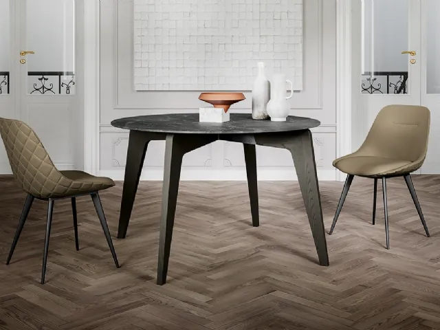 Tavolo rotondo Magic con top in laminato e gambe in massello di Frassino verniciato di Arredo3