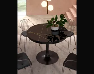 Tavolo rotondo allungabile Eclipse con top in marble glass Sahara Noir Lucido di Ozzio