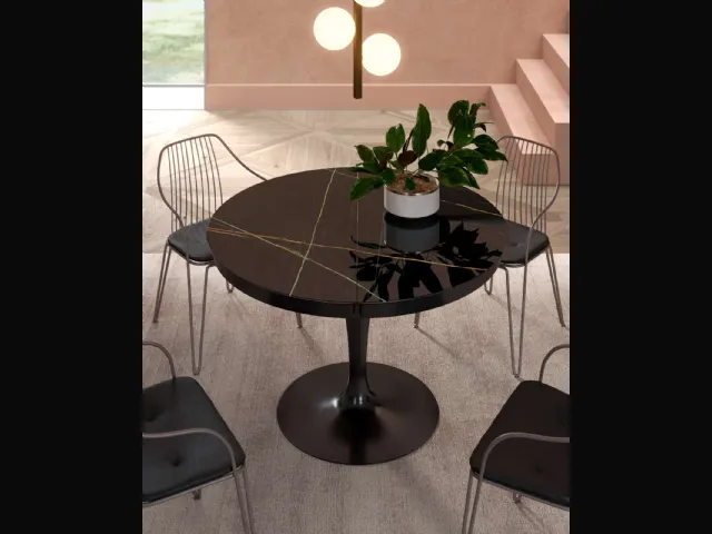 Tavolo rotondo allungabile Eclipse con top in marble glass Sahara Noir Lucido di Ozzio