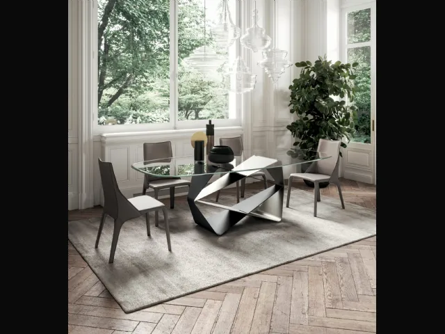 Tavolo scultura con piano in cristallo e base in metallo Gem di Ozzio