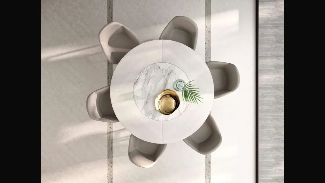Tavolo rotondo allungabile in legno Veliero con vassoio girevole Lazy Susan in ceramica incassato nel piano di Ozzio
