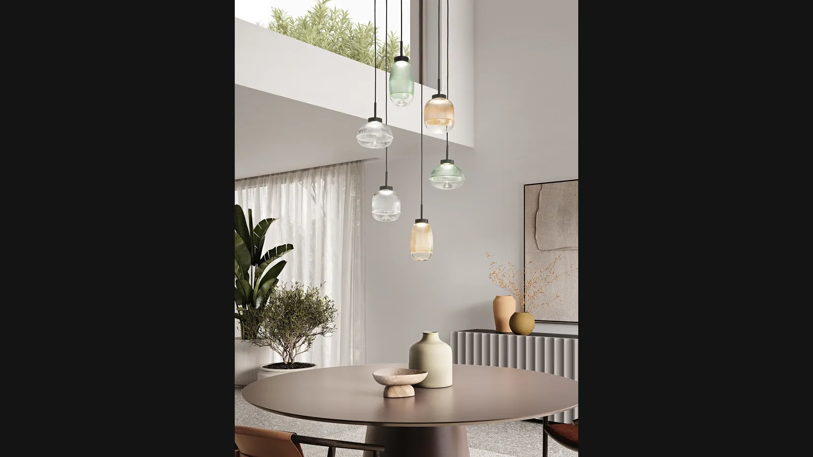 Lampada a sospensione Ekos in vetro di Ondaluce