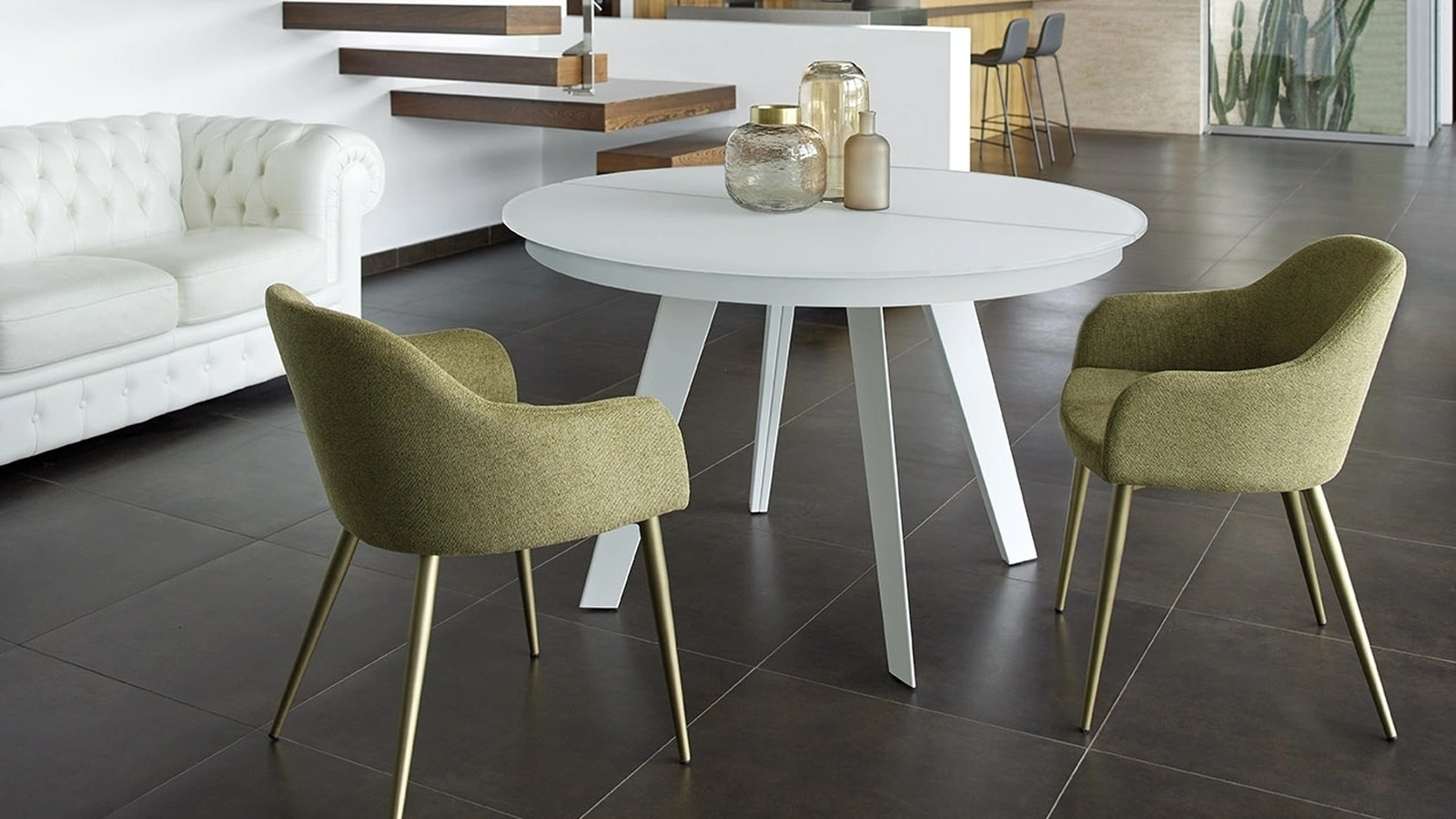 Tavolo rotondo allungabile con top in vetro e gambe in metallo Sirius T33 di Friulsedie